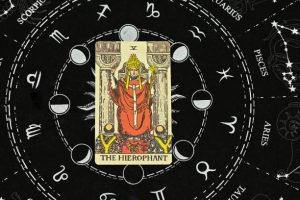 Kapłan na tle konstelacji zodiaku astrologicznego horoskopu.