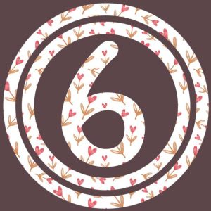 Stylizowana cyfra sześć pojawia się w okrągłym wzorze ozdobionym motywami kwiatowymi w celach dekoracyjnych.