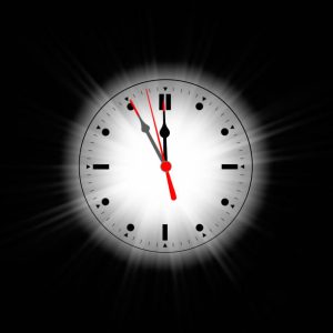 
Koncepcja czasu i nieskończoności tarczy zegara i świecącego światła